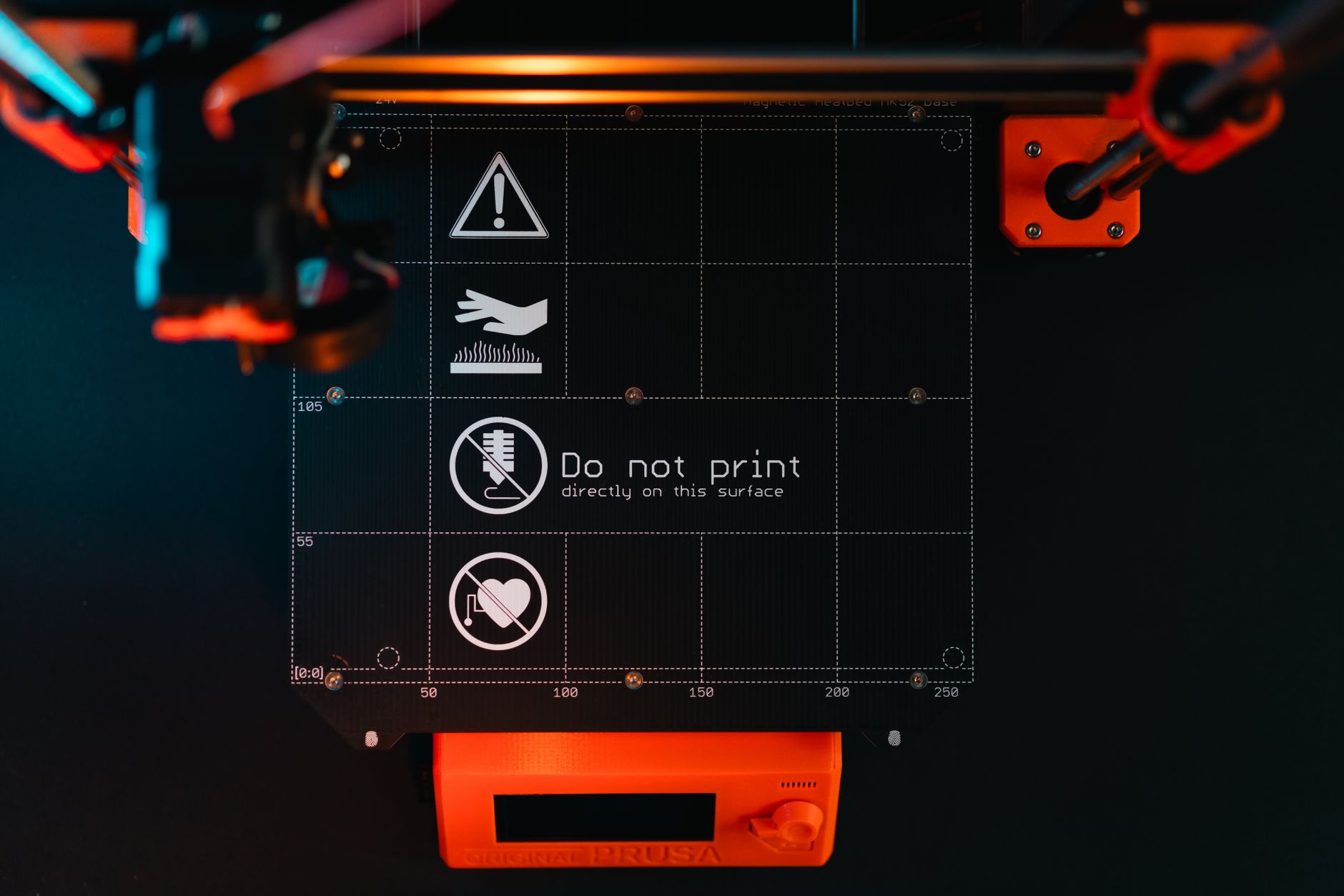 Detailed view of a 3D printer working on a design with the Ender brand logo visible.