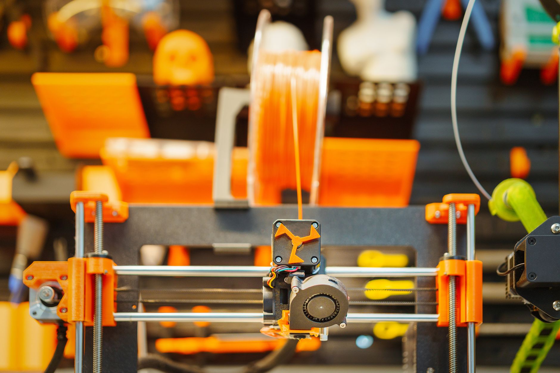 High-quality close-up of a 3D printer printing an object with resin.
